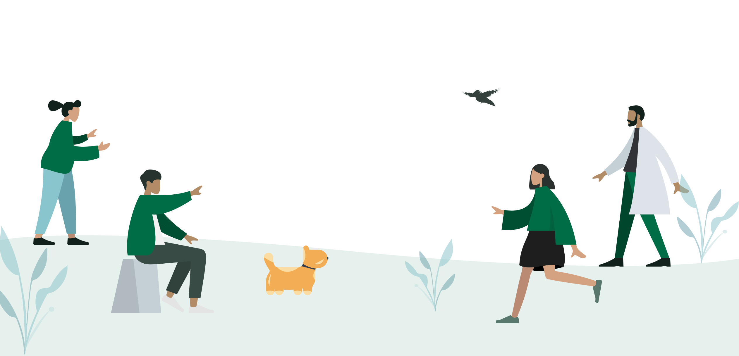 People playing in a field with a dog.